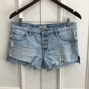 Free People light blue jean cut off fringe shorts